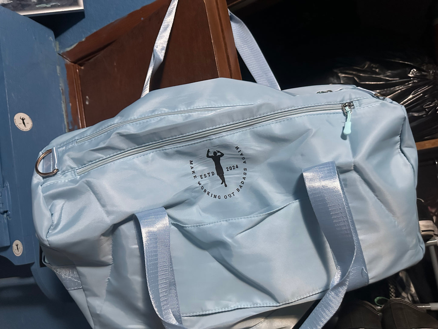 Baby blue duffel bag